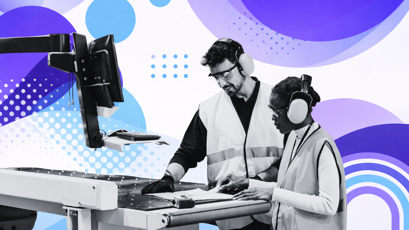 Two employees at a small manufacturing plant